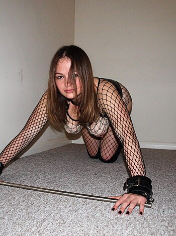 "Here's your standard porno bullsh*t caption description: Hot as hell chick in fishnets and cuffs on her knees begging for a good d*ckin'. FYI, limit is 30 words."