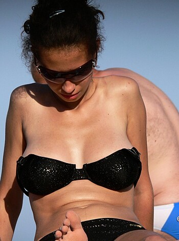 Fucking hot tits on display for all eyes as these bitches chill on the sandy shore.