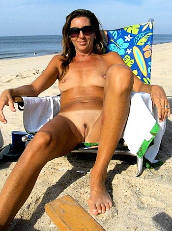 "Here's a vulgar description of a chick sunbathing on the fuckin' beach, her tits hangin' out for all you pervs to see."
