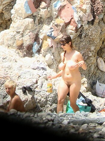 "Here's your hot chick fucking around on the fucking beach with her tits and ass out, so fucking sexy."