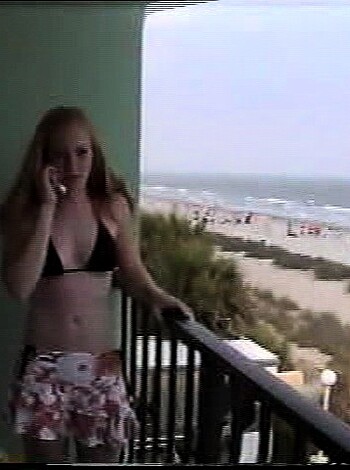 "Dude, check out this hot chick in her tight bikini, laying on the sandy beach with a cellphone clamped to her ear, her tits swayin' in the wind like a pair of ripe melons."
