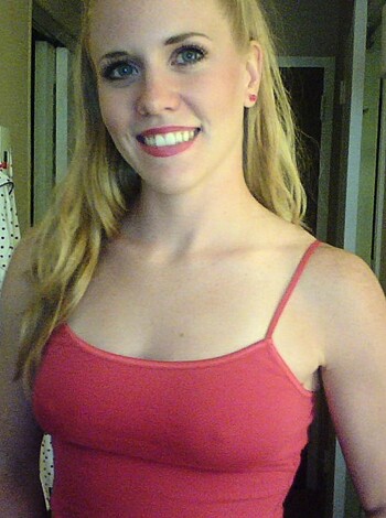 Fuckin hell, bitch! Look at this hot piece of ass motherfucker. Check out that sexy lady with the tight tits and juicy boobs wearing a fucking red rack-showing tank top. Yep, she's definitely got a fine ass. Fuck yeah.