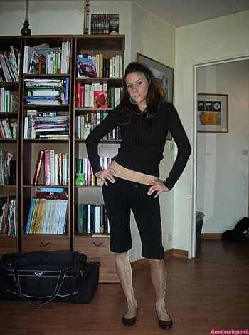 "Here's a fucking hot shot of some bitch, strutting her stuff in tight black lace underwear with high heels on the carpeted floor of a goddamn living room."