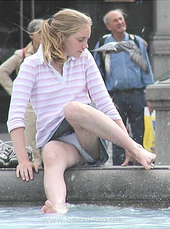 "Yo, bitch! Look at this ho, sittin' her dirty ass on a public fuckin' fountain, without no shoes or shit, actin' all high and mighty like she ain't just some low-life street trash. Fuck that."