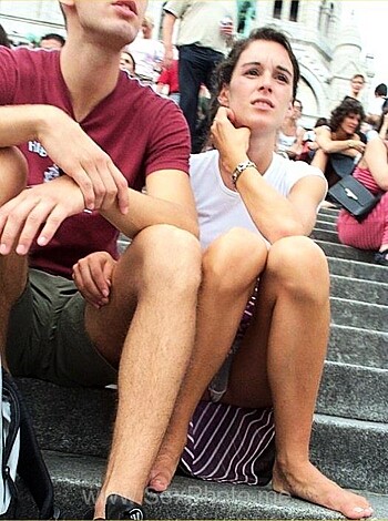 The f*cking dude and bitch are chillin' on the stairs, crotches cross-linked and fingers fondling each other's kneecaps.
