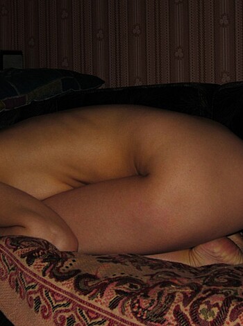 Here's a photo of some chick sleeping with her ass hanging out.