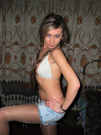 """
Here's a picture of some busty blonde chick, showing off her tits while grinning like a fucking idiot.
"""