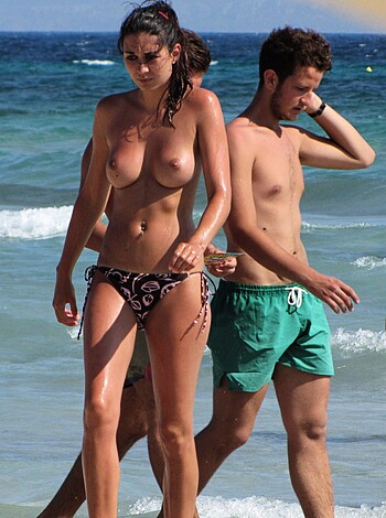 """Fucking check out these tits bitches, look at that cock swingin' dick, fuck me that shit is hot as hell, I'd suck those cocks till they explode! Yup, just a regular beach day with some fine ass fuckers. Get your tan on while you watch these three fuckers fucking around. This scene is so damn sexy, it makes my pussy all wet and tingly. Goddamn I'd love to join 'em in the water, feel those bodies against mine, and get my tits out for them to play with. Fucking aye. Beach day ftw!
"""