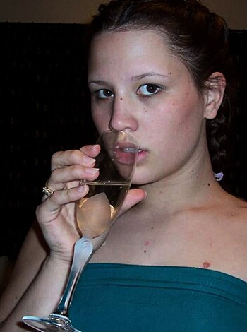 Look at that fucking bitch with her slutty ass dress and a goddamn wine glass.