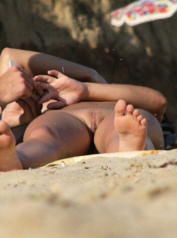 "Here's a naked broad layin' on the sand, with dicks and fuckin' toes all around her."