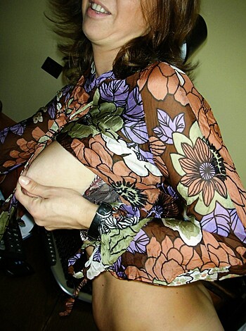 "Look at this hot bitch pulling down her panties to show you her tits and shit."