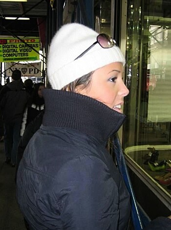 A goddamn bitch checking out some fucking shoes.
