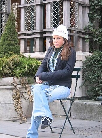 "Here's a chick sitting on a fuckin' bench, dressed in denim pants and a bitchin' leather jacket."