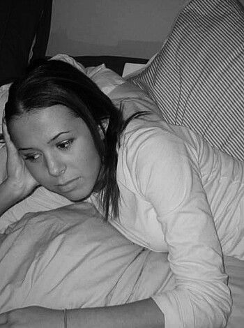 "Fucking hot babe spread-eagled naked on the bed, face down in the sheets."