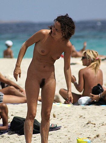 Fucking bitch strutting her tits on a fucking packed sandy shore, bro.