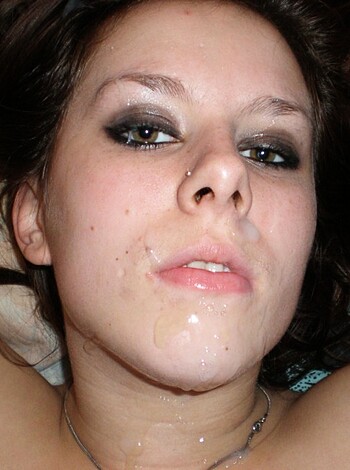 "Here's a naked bitch lying on the fucking bed with her pussy lips exposed and her clit hard as hell, while she's showing off that sweet bush of hers."