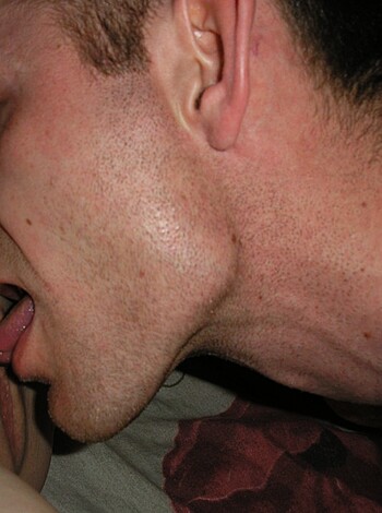 Vulgar Description: "Here's a pic of some dude suckin on a chick's titty like it ain't nothin'. You wanna see more, hit me up."