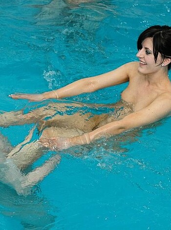 Here's the dirty, horny, naked couple having an underwater fuck sesh with their junk floating around like two dolphins mid-coitus while getting all slippery wet in each other's body fluids.
