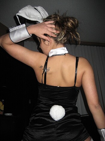 """
Fucking sexy bunny chick with fluffy ass ears and kinky plastic tail. 
"""