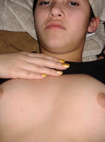 "Here's a picture of some hot ass titties with a chick spreading her legs out for you to look at."
