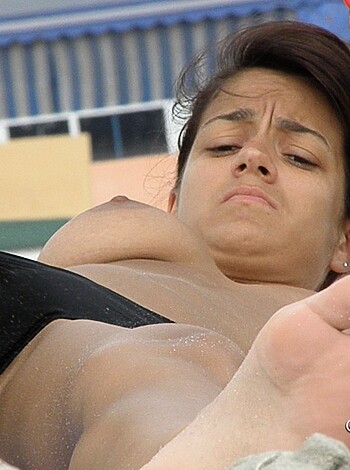 "Bitch gots some sexy feet and she knowin how to use 'em too cuz she givin' some sweet, sweet foot rubs to that bitch ass hoe."