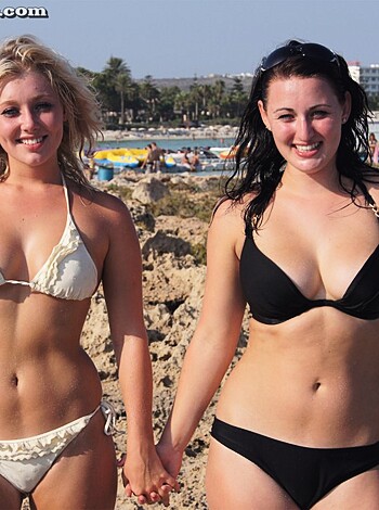 "Fucking hot chicks in skimpy swimsuits horsing around on the sandy shore."
