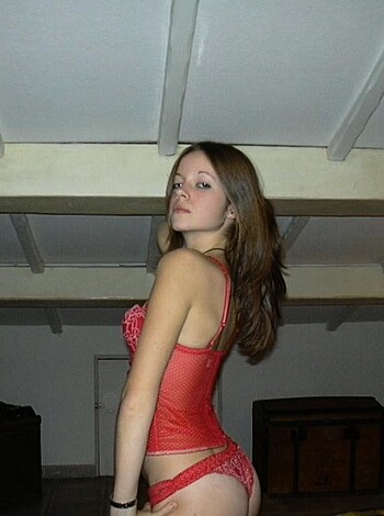 """
Babe in lacy red panties and bra, doing a sexy pose on the fucking table while bending over, with her ass stuck out like a goddamn protruding ass-crack, getting taken from behind by a dude who’s about to stick his dick up her snatch.
"""