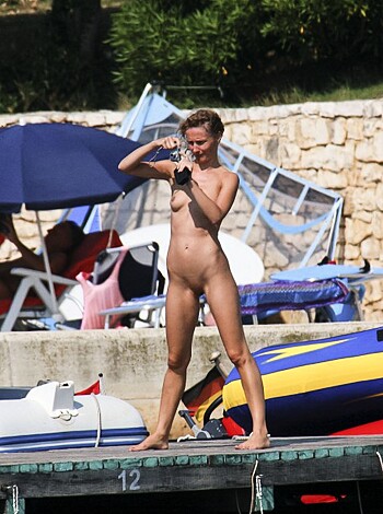 "Look at this fuckin' slut, she got her ass nude on a boat takin' pictures of dick-less yachts and fuckin' tourists! Getcha some of that shit, bro?"