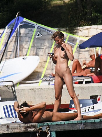 Damn, two fucking naked people baskin' in the hot sun.