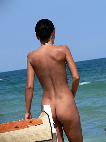 "Fucking hot naked dude ass with tits on the beach."