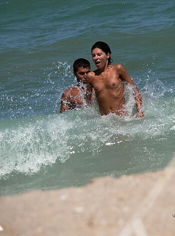 Here's two naked bros getting fucked up in the surf, dudes.