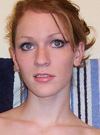 "Check out this hot chick with her lipstick on, showing off her tits while trying to look sexy with a fucking towel on."