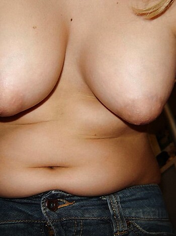 A busty broad's tits with nips on display.