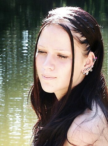 "Here's a picture of some fucking hot chick sitting by the fucking lake wearing a goddamn earring and nose ring, with her hair all fucking down and wet. Jesus Christ, look at those tits."
