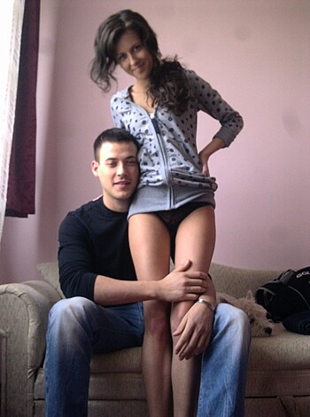 "Here's a shot of some bitch straddling some dude with her tits and panties out."