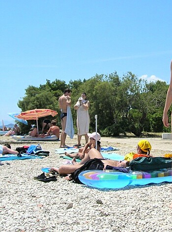 "A titty-ass bitch on a sandy shore, surrounded by fucking tourists and cheap umbrellas."