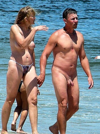 "Here's a fucking picture of two naked dudes strolling down the shore, enjoying their goddamn vacation."