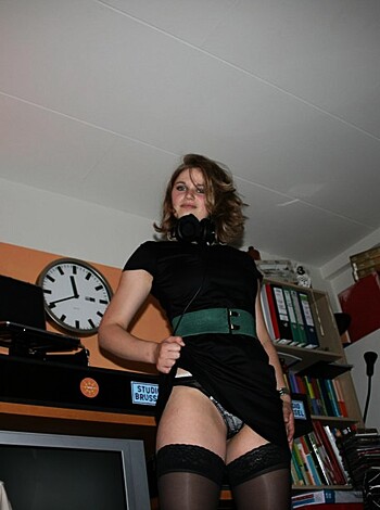 """
Here's a sexy bitch in pantyhose and garters, fuckin' awesome.
"""