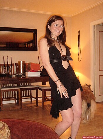 "Check out this hot bitch in her fuckin' tight little black dress with a sexy goddamn slit up to here, and her fucking stilettos making that clickety clack sound on the floor while she stands there all goddamn confident like. She knows she looks good, and it's fucking obvious."