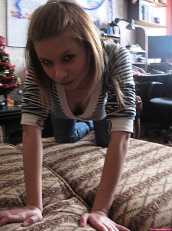 Vulgar Description: "Here's a pic of some busty teenage slut with her massive boobies pushed up against the cushion of a couch, fucking shit up."