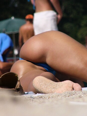 The image is of a hot ass at the fucking beach surrounded by horny bastards, bro.