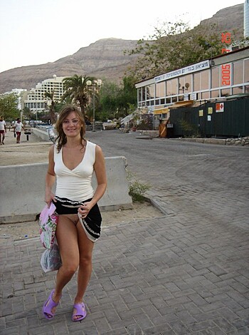 "Hey man, check out this hot chick on the street in her barely-there white top and tight skirt. She looks like she wants to fuck some dudes, you wanna hit that?"