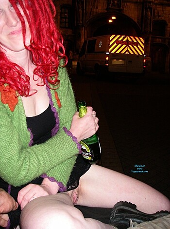 Here's a fucking limiter: A dirty chick with her ass up on the streets, dangling her feet, getting ready to suck some cocks and get pounded by some random dudes.