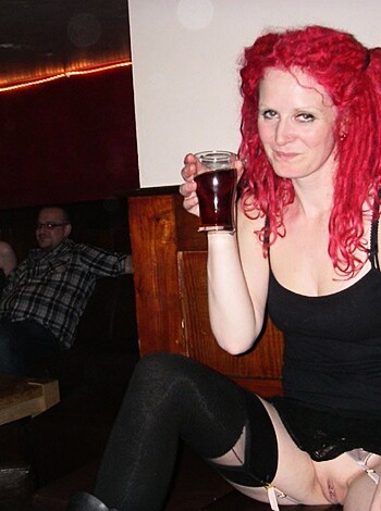 "This image shows a chick suckin' down booze while she's got her sexy lingerie on, bro."