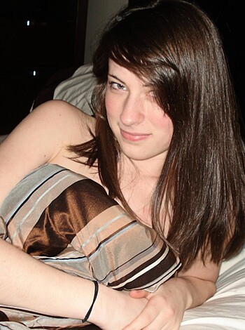 A fucking naked bitch lying on a motherfucking bed.