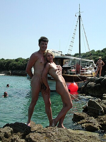 "Look at these two fucking idiots getting naked and humping by the shore like they're on some kind of stupid porno shoot."