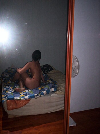 "Here's a fuckin' picture of some naked bitch chillin' on a goddamn bed, ya dig?"