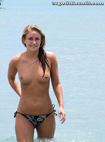 "Bikini-clad babe getting fucked on beach."