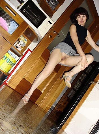 "Here's a photo of some slutty bitch wearing a black t-shirt with no fucking pants."