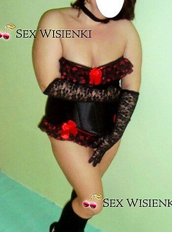 This image is a freaking hot shot of some fine-ass bitch fuckin' modelin' sexy lingerie while she spreads them legs wide open like a damn whore, and throws her fucking hands on her fucking thighs, man.